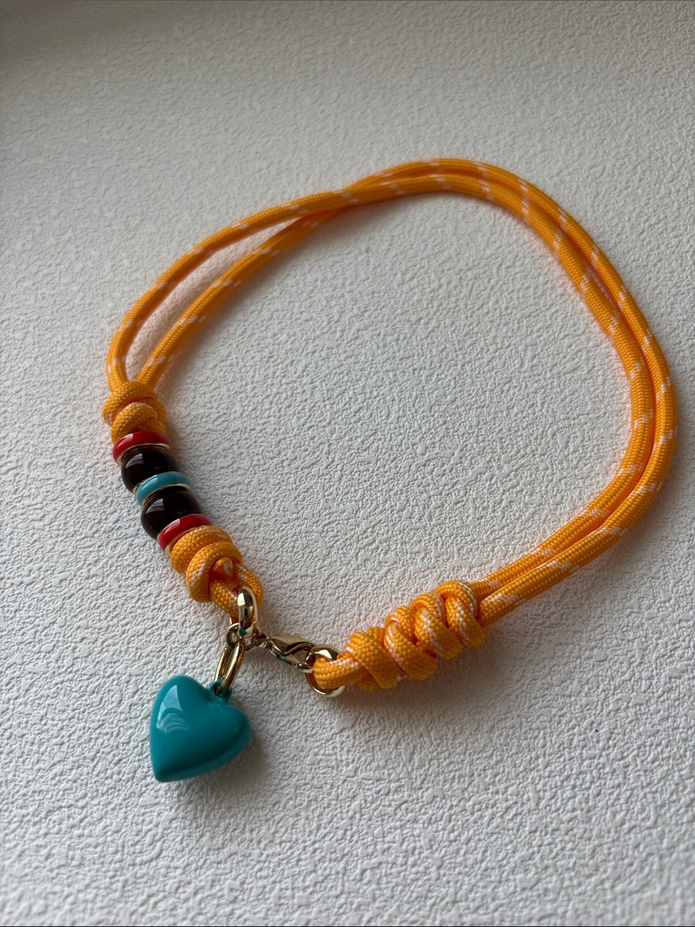 NWOT Roxanne Assoulin happy cord necklace